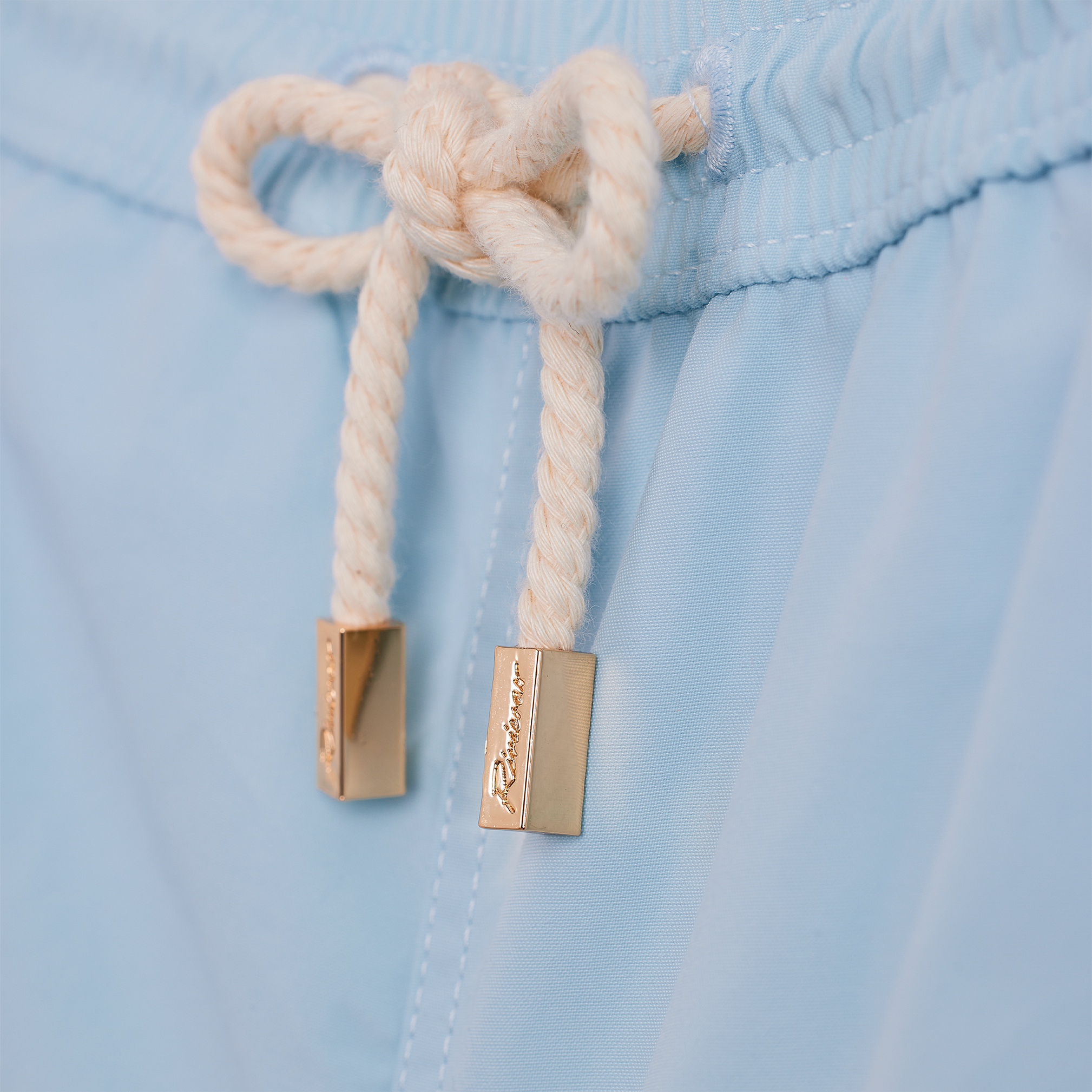 Sky Blue short swimshorts with side and back pockets