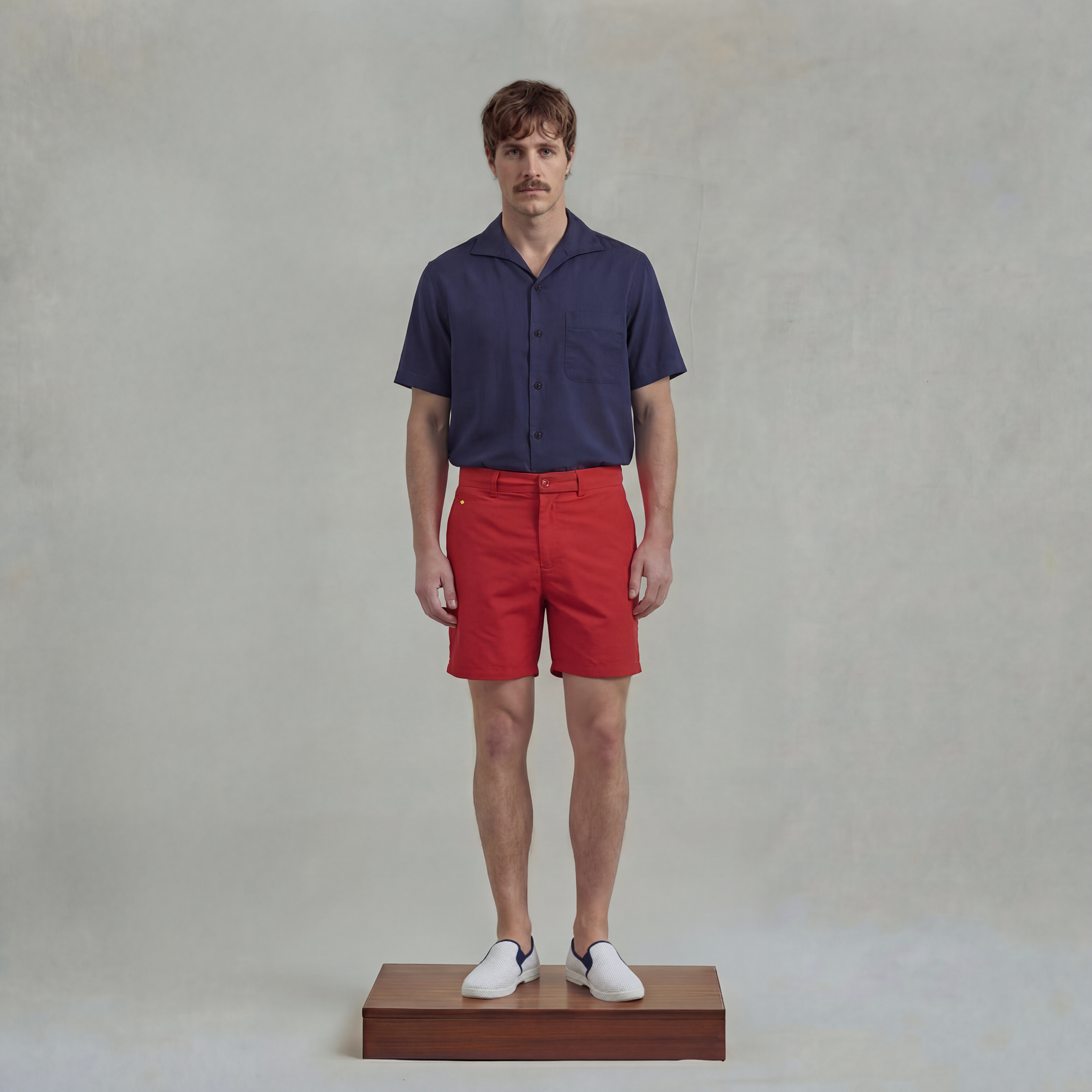 Red swimshorts with piped pocket