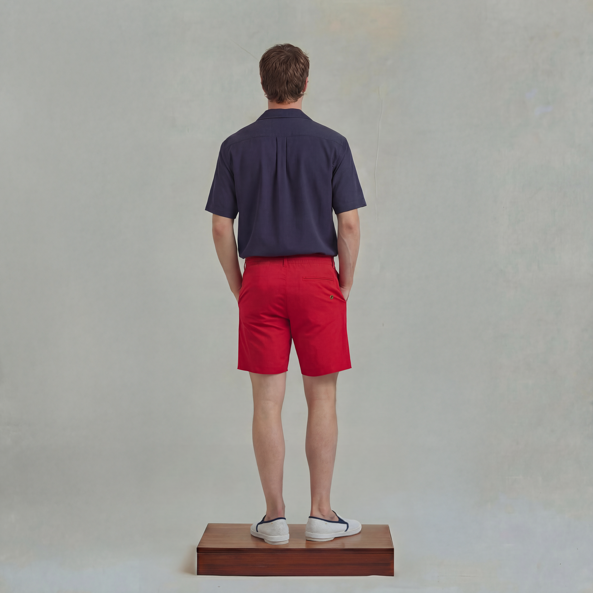 Red swimshorts with piped pocket