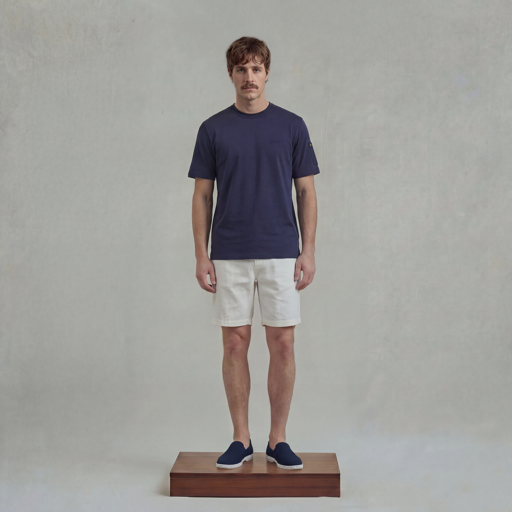 Navy t-shirt with sleeve pocket and chest embroidery