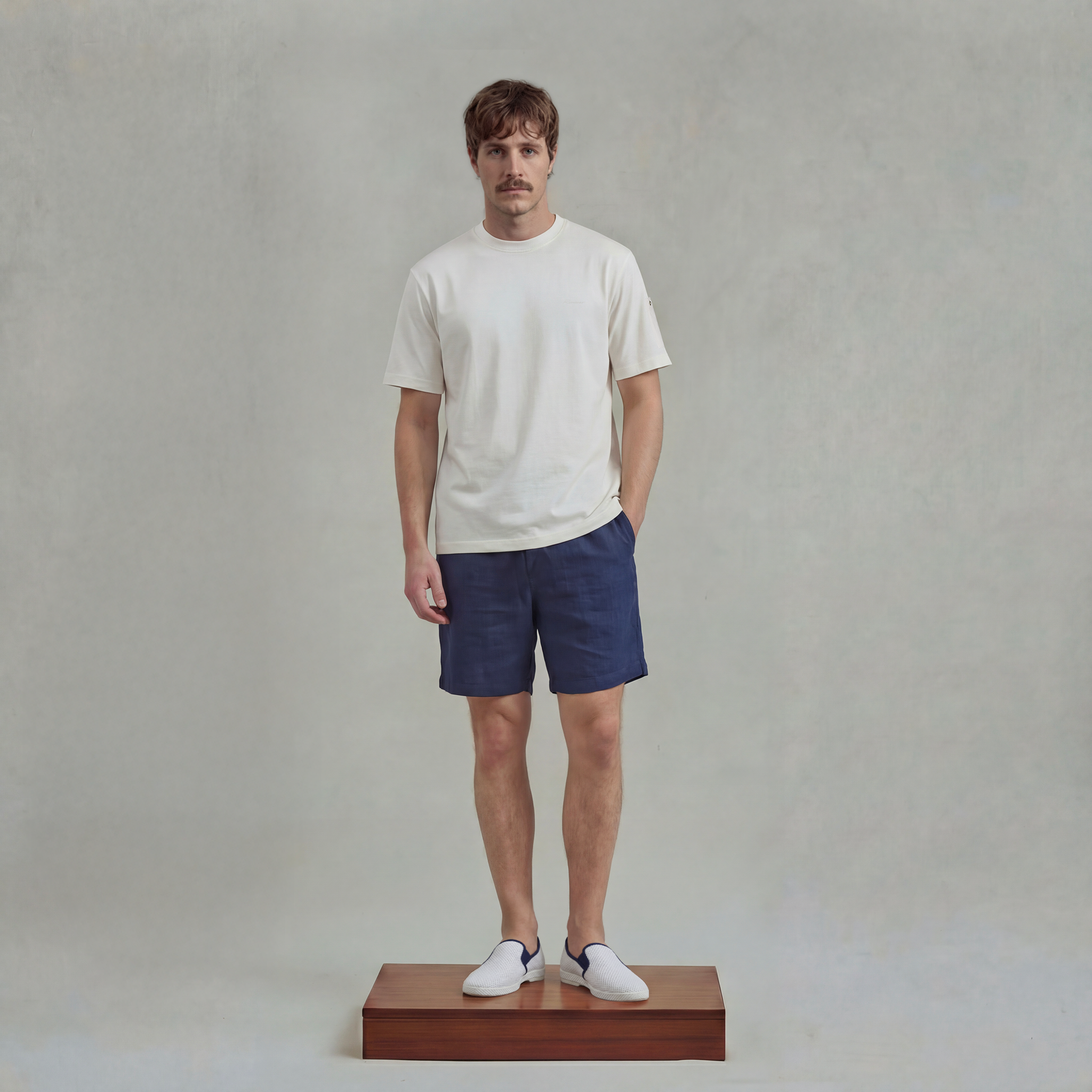 White t-shirt with sleeve pocket and chest embroidery