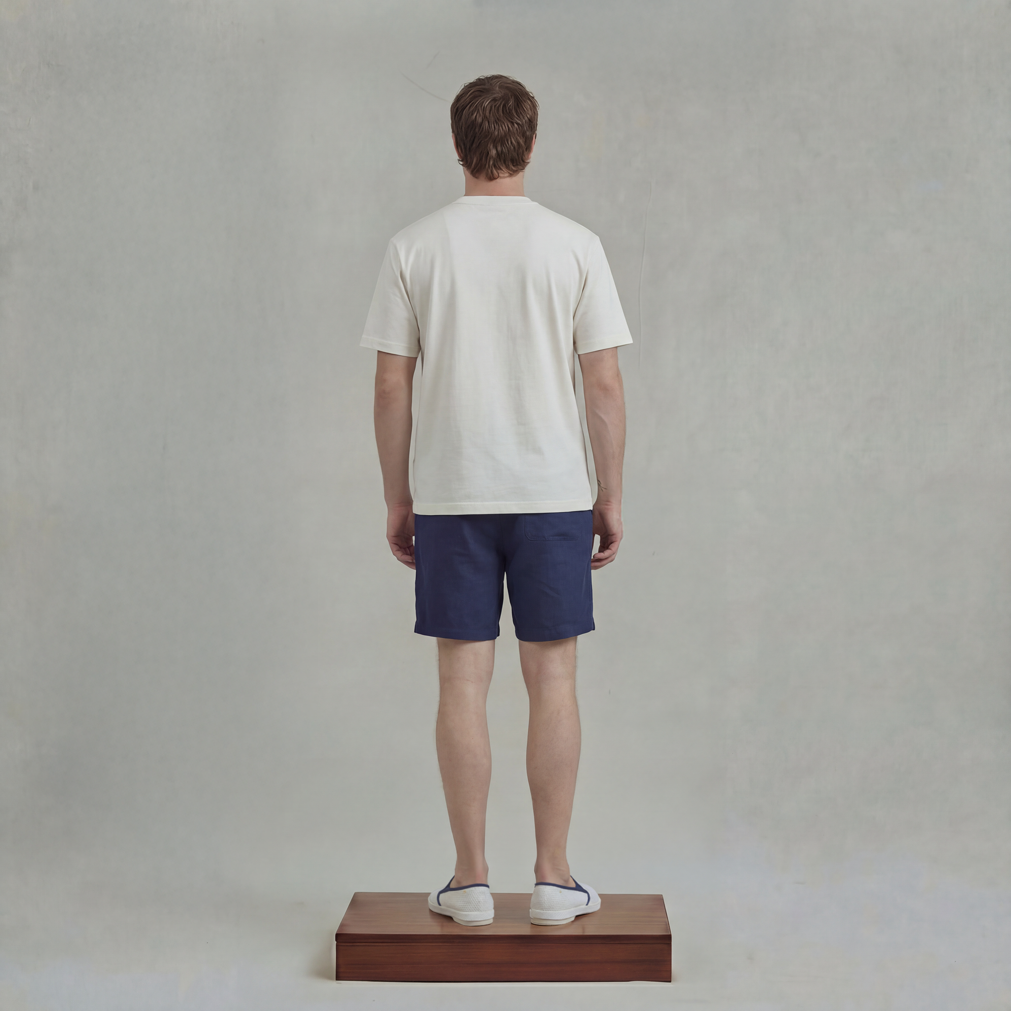 White t-shirt with sleeve pocket and chest embroidery