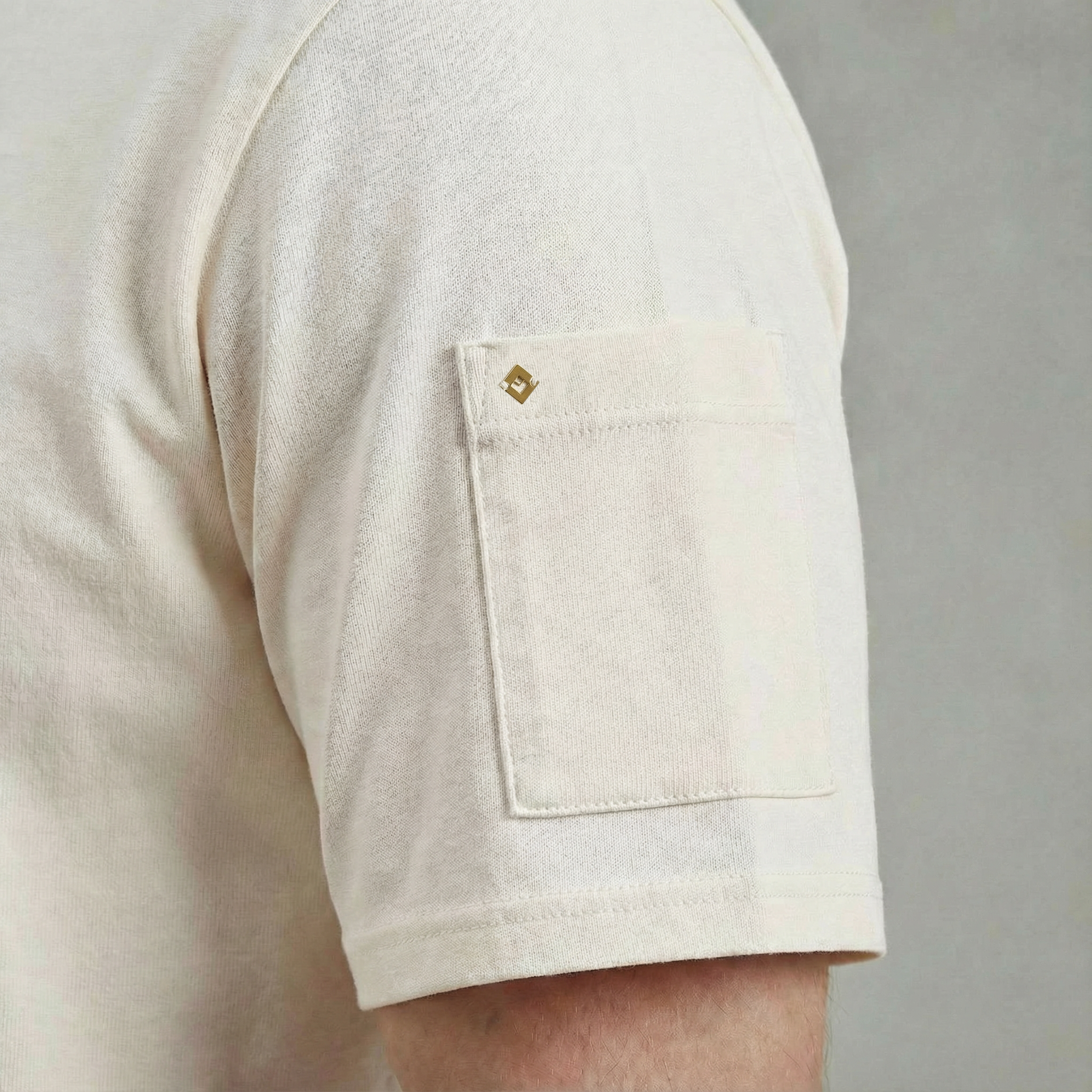 White t-shirt with sleeve pocket and chest embroidery