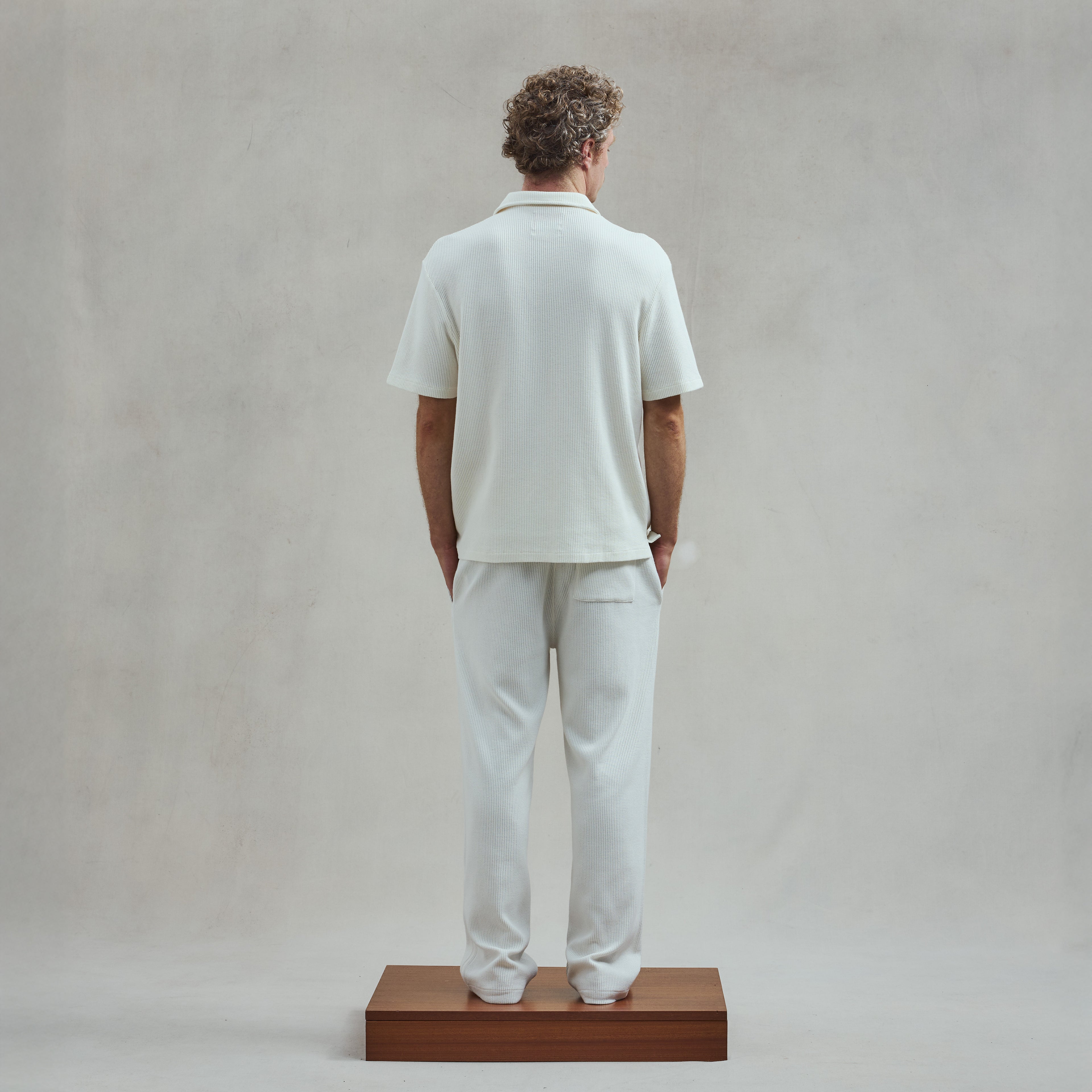 Polo col requin boutonné en interlock