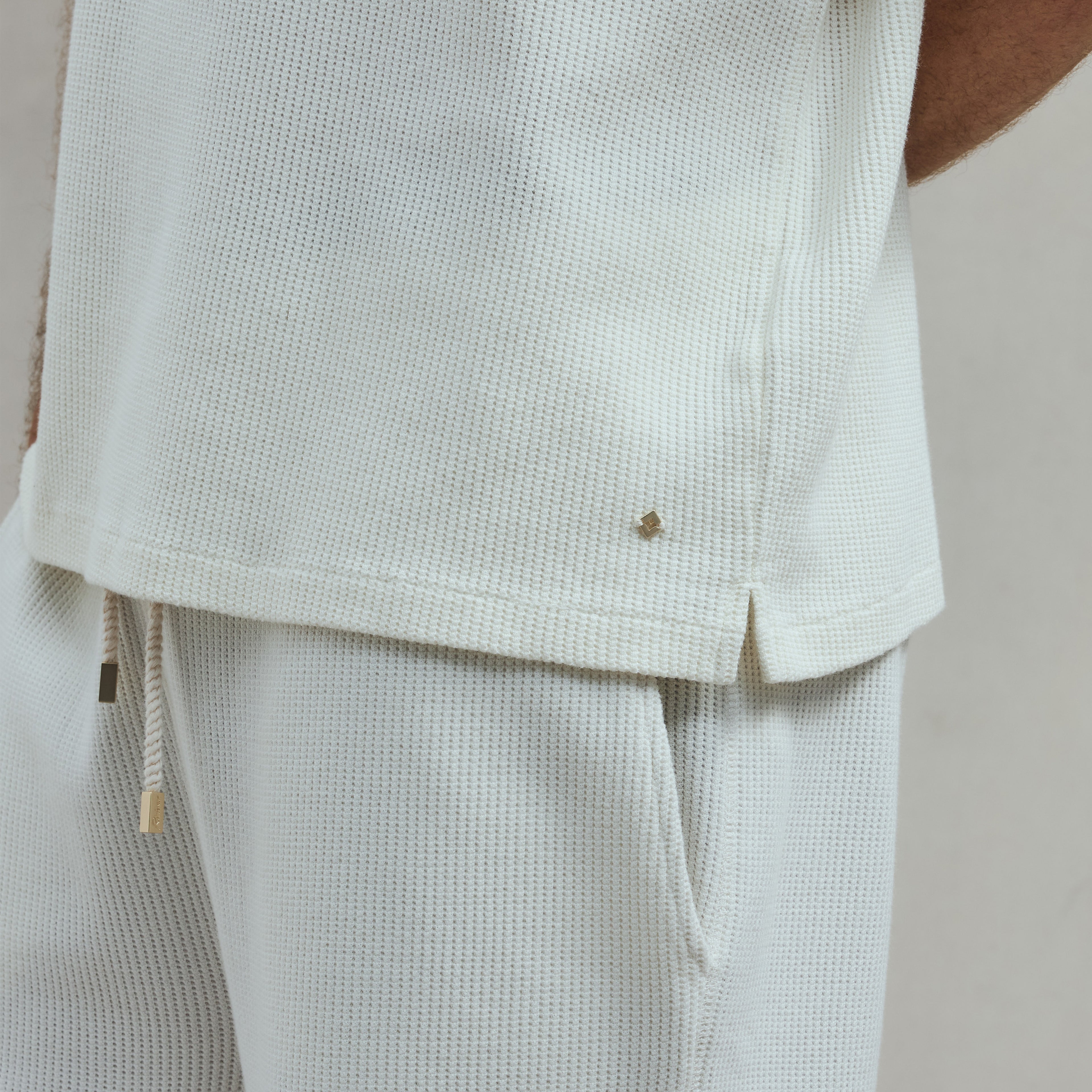 Polo col requin boutonné en interlock